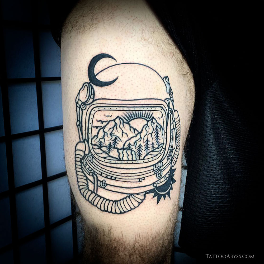 Neotraditional style diving helmet tattoo located on