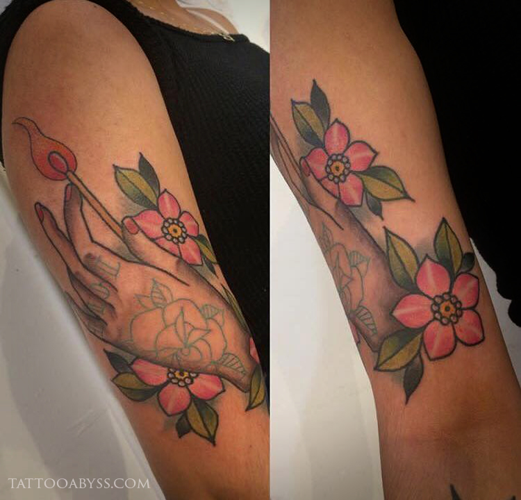 hand-match-blossoms-kevin-tattoo-abyss