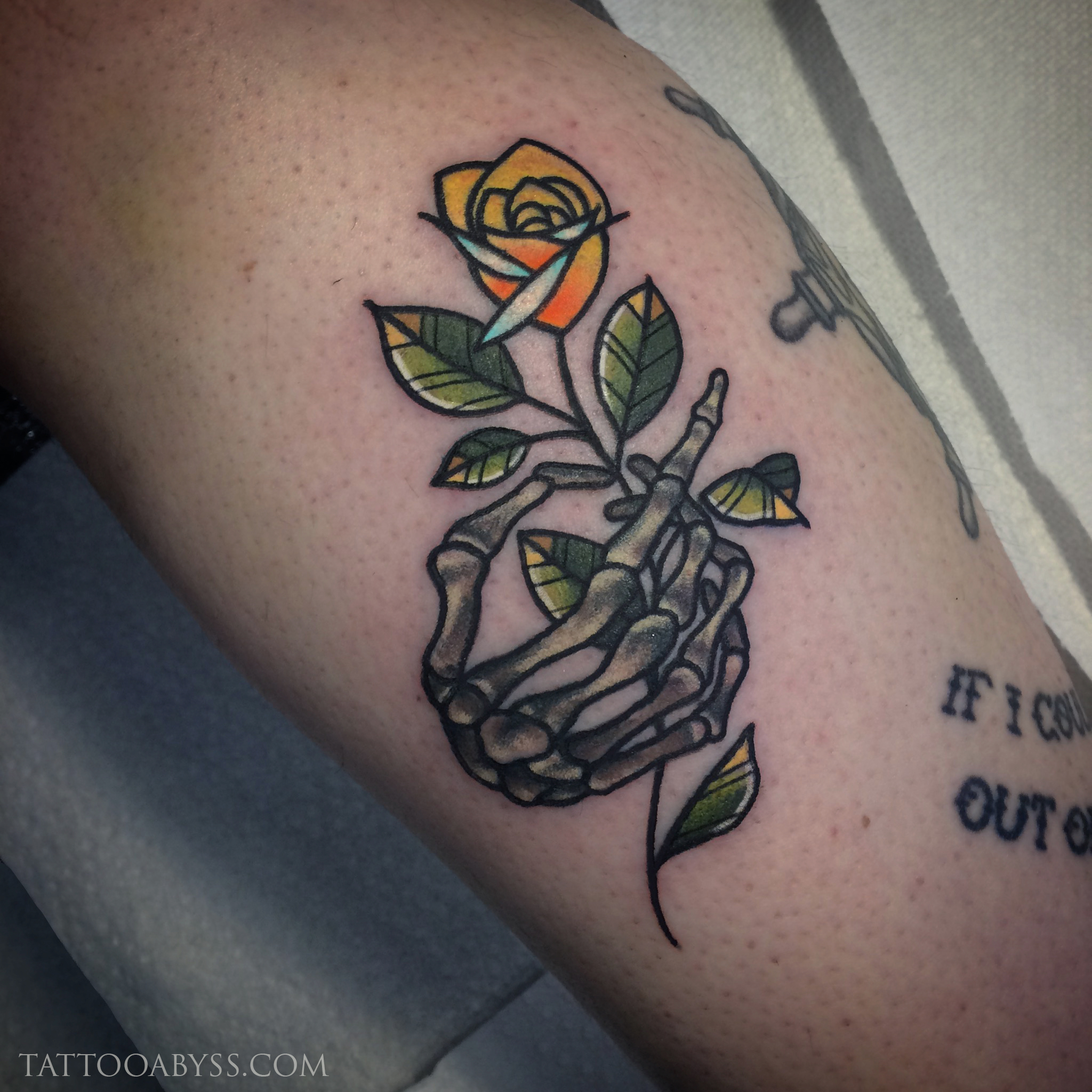 tattoo with skeleton hand holding flowerTikTok Search