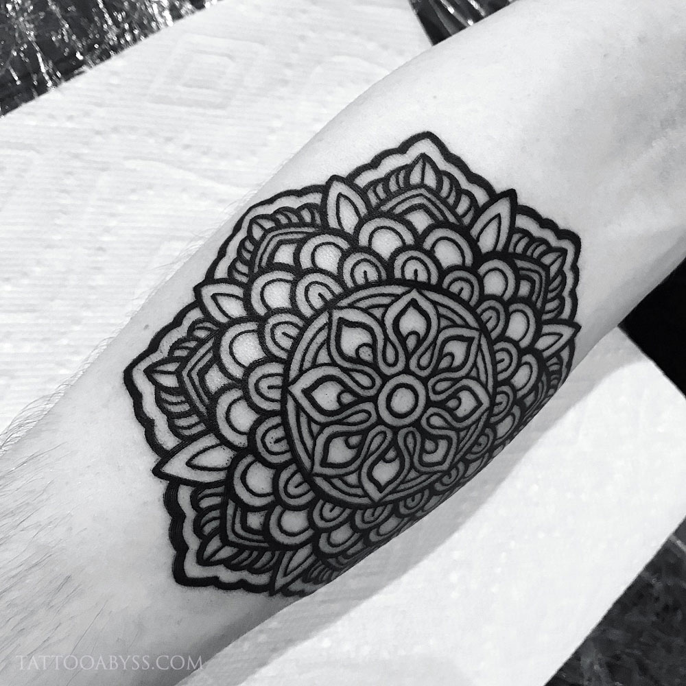 Premium Vector | Black mandala tribal flower symbol logo on white  background. stencil decal tattoo design. flat vecto