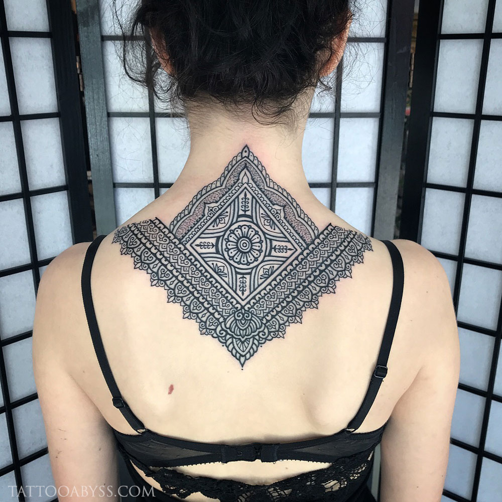 Thoughts on a neck tattoo of two doves on either side of my neck and a  mandala in the centre with the doves slightly overlapping the mandala.  Added some inspo for styles