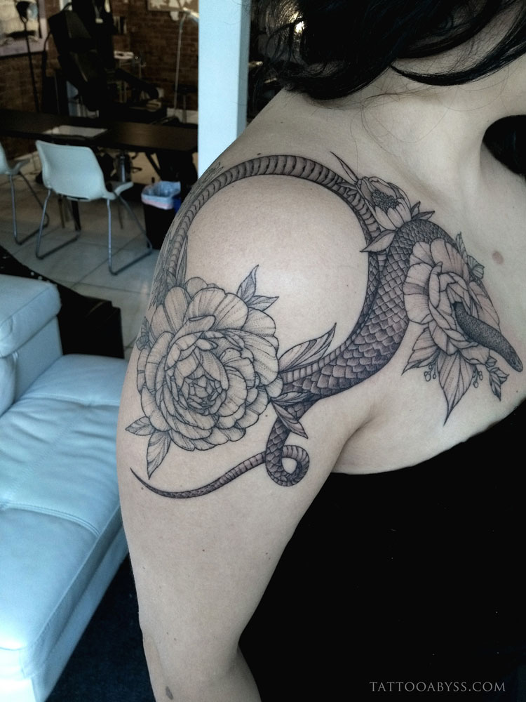 Tattoo uploaded by Liz • snake with daffodils. . . . . #snake #snaketattoo  #blackwork #blackworktattoo #daffodils #flowers • Tattoodo
