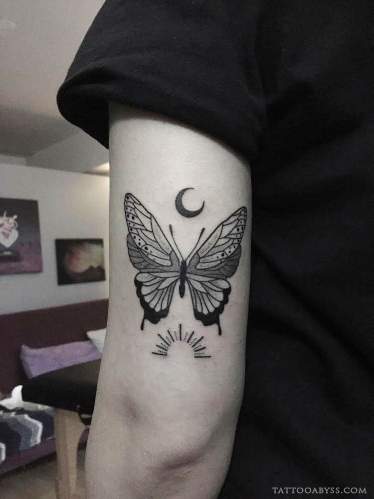 Fine line butterfly and sun and moon tattoo