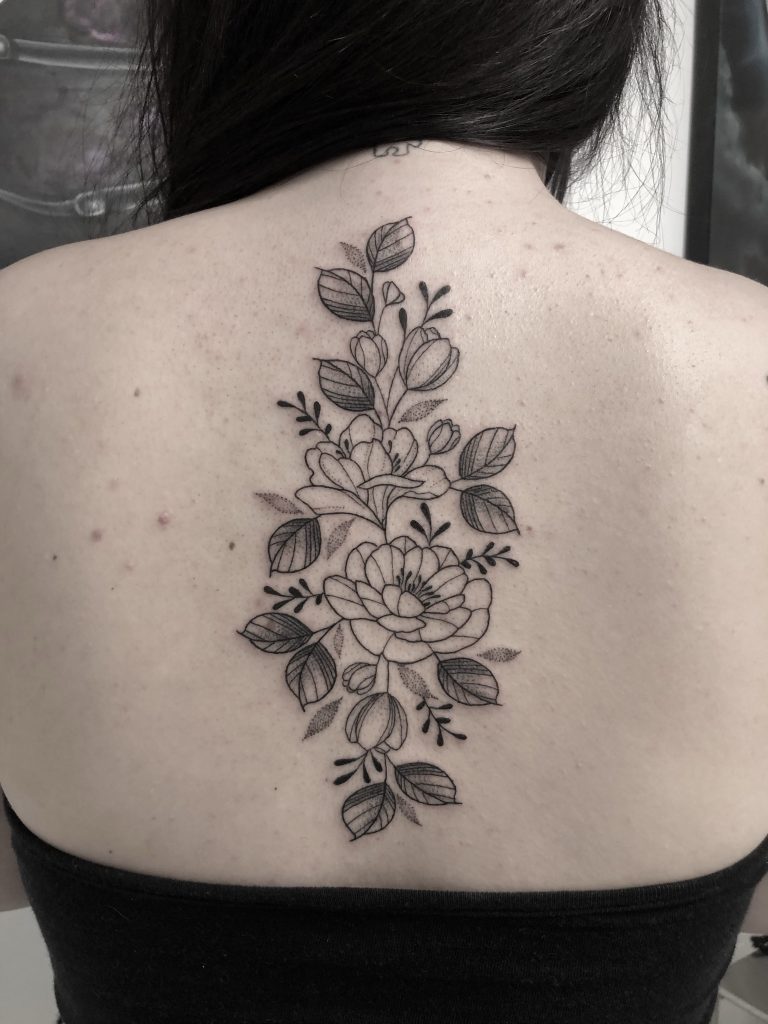 Floral-spine-tattoo-abyss-montreal