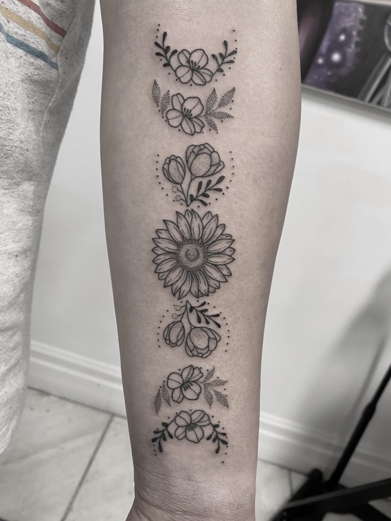 Floral-moon-phases-tattoo-abyss