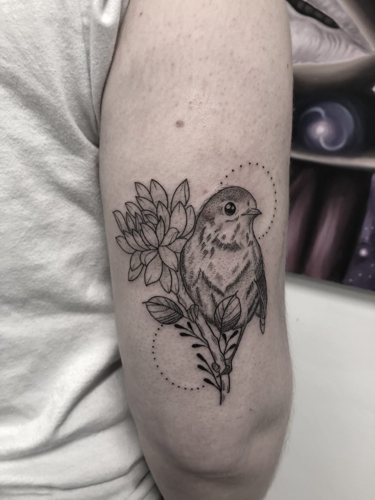 small-bird-with flower-tattoo