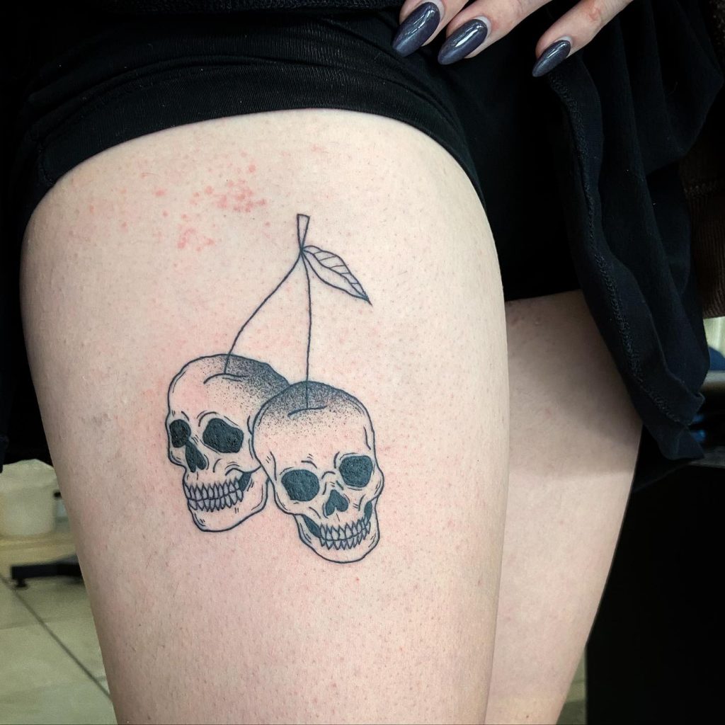 Premium Vector  Sweet cherry skull cherry skull and heart sketch of a  tattoo halloween flat design