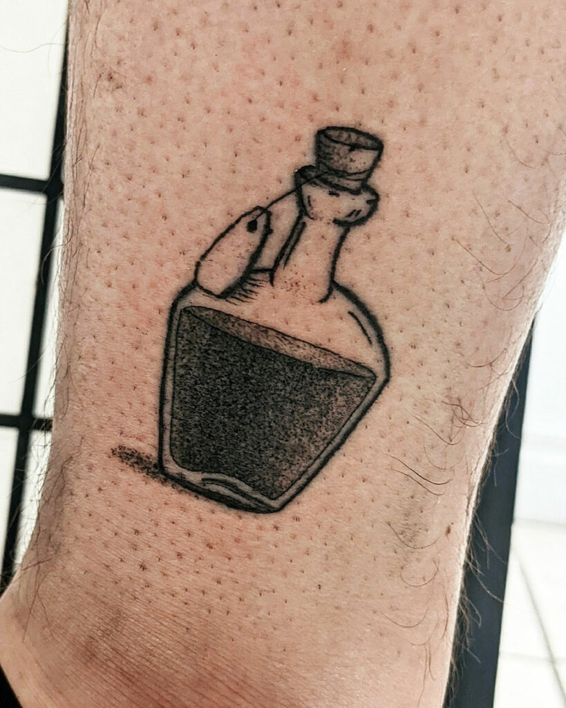 Poison bottle from Emperor's New Groove done by @inkbychelle_ #tattoo # tattoos #emperorsnewgroove #traditionaltattoo #poisonbottle… | Instagram
